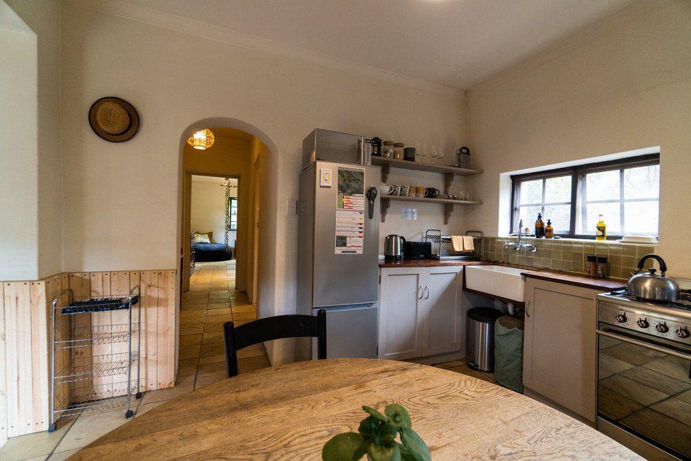 Botanica Cabin showing the interior of the kitchen area with cosy lighting