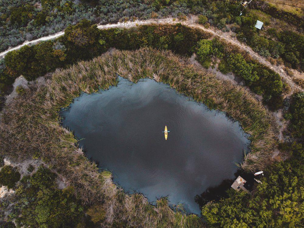 Botanica Cabin showing bird's eye view of the dam