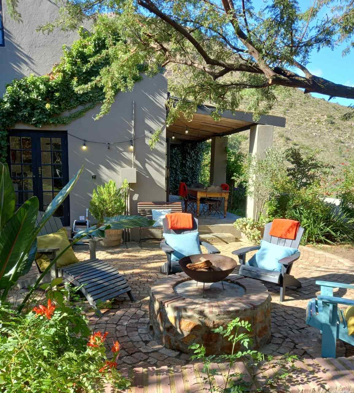 Porcupine Hills - Farmhouse - view of chairs outside on patio