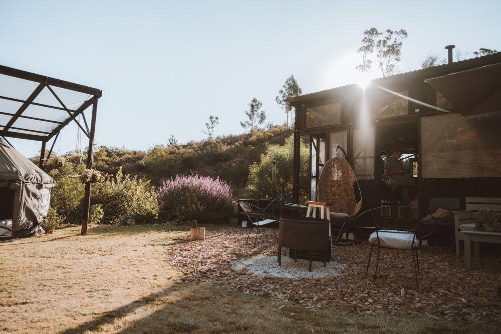 Malachite Yurt exterior showing the firepit