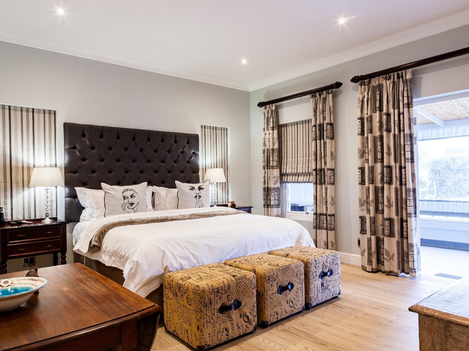 Karoo Masterclass house showing one of the bedrooms with a double bed.
