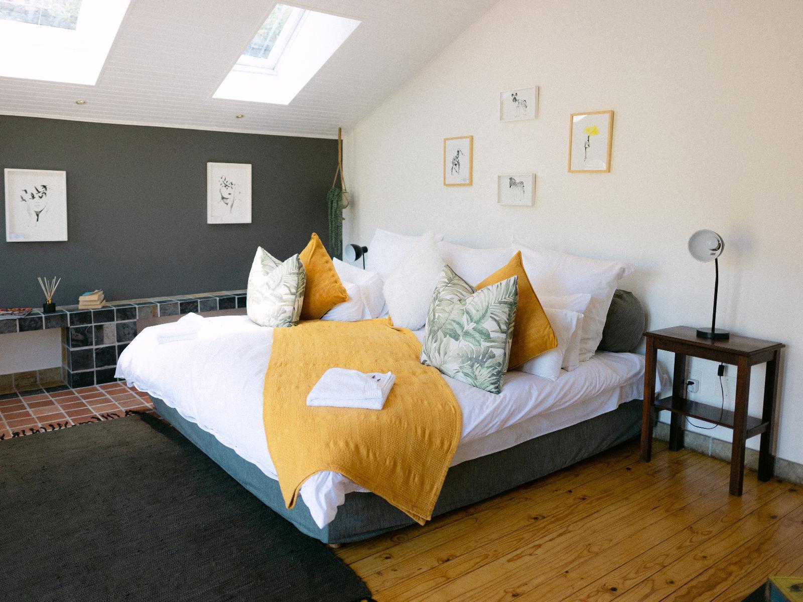 Chardonnay Suite: Vineyard rows below dramatic sunlit mountain range